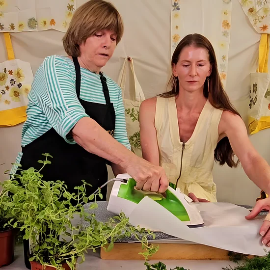 Module 5: Theresa heat-setting a printed tote with a clothing iron and parchment paper
